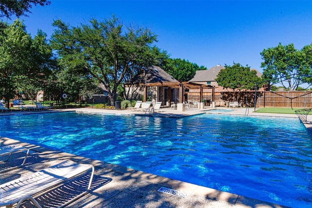 8504 Beatton Ct, Plano, TX 75025 - community pool featuring a patio area and a pergola