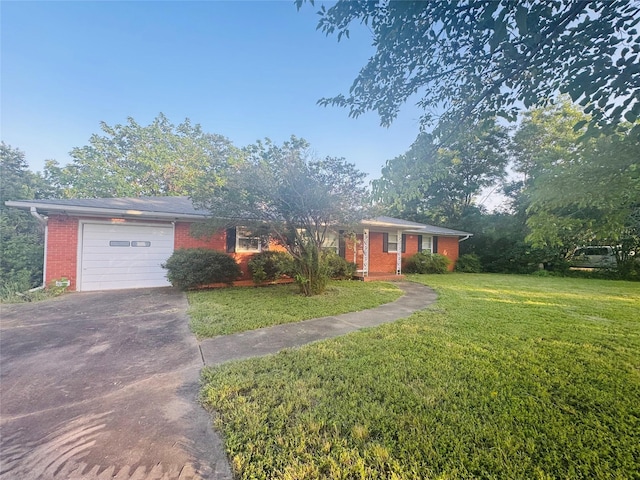 311 E Newland Dr, Robinson, TX 76706 - ranch-style home featuring concrete driveway, brick siding, and a front yard