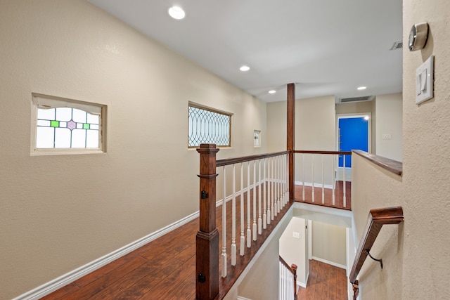 4147 Woodside Knl, Grapevine, TX 76051 - hallway featuring an upstairs landing, wood finished floors, and recessed lighting