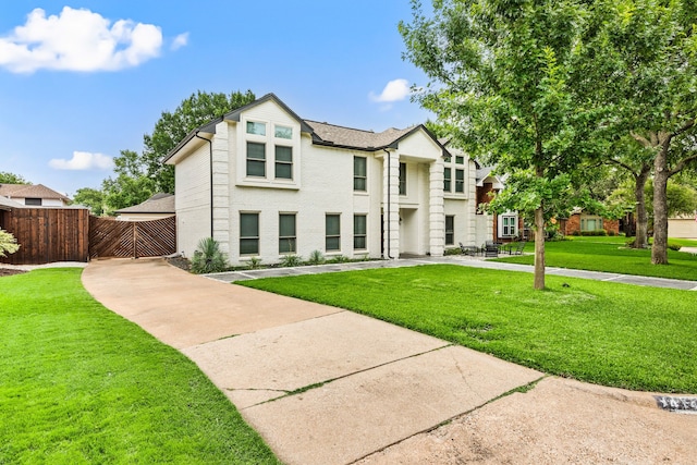 4147 Woodside Knl, Grapevine, TX 76051 - view of front of house featuring a gate and brick siding