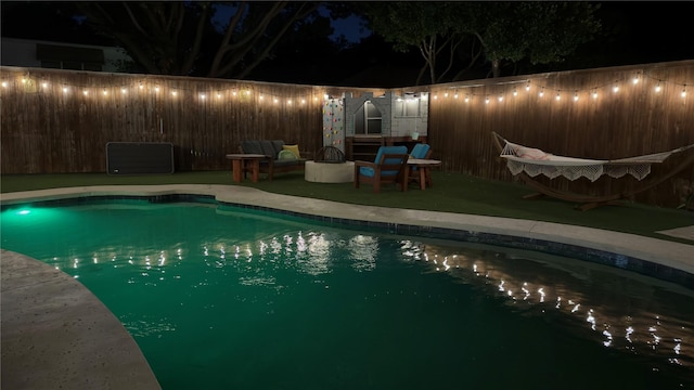 4147 Woodside Knl, Grapevine, TX 76051 - pool at twilight with a fenced backyard and a patio area