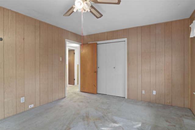 10230 Kilkenny Pl, Dallas, TX 75228 - unfurnished bedroom featuring carpet, wooden walls, and ceiling fan