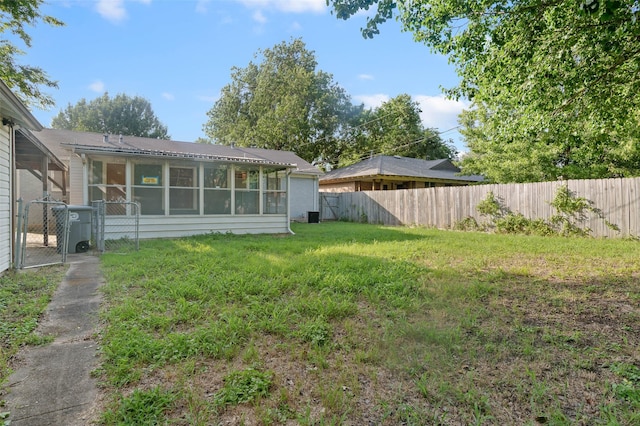 10230 Kilkenny Pl, Dallas, TX 75228 - fenced backyard with a sunroom and a gate