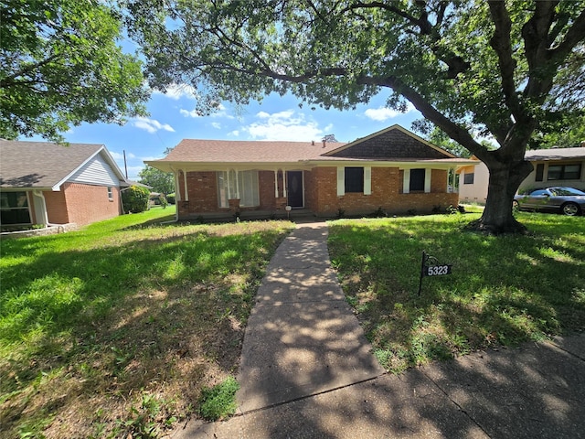 5323 Dazzle Dr, Dallas, TX 75232 - ranch-style home featuring brick siding and a front yard