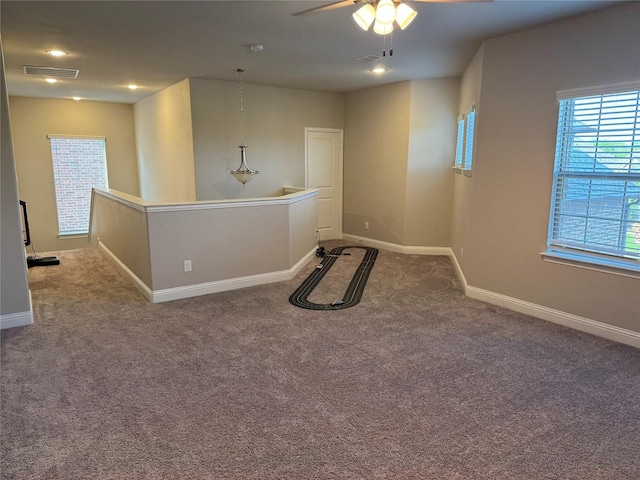 3323 Royal Ridge Dr, Rockwall, TX 75087 - spare room with carpet flooring and ceiling fan
