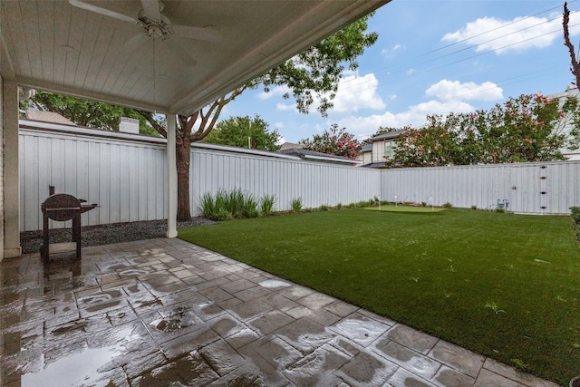 7402 Centenary Ave, Dallas, TX 75225 - fenced backyard featuring a ceiling fan and a patio