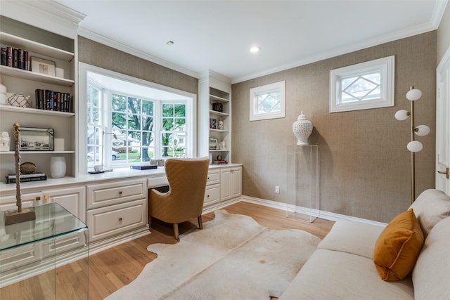 7402 Centenary Ave, Dallas, TX 75225 - office with built in study area, light wood-style flooring, wallpapered walls, and crown molding