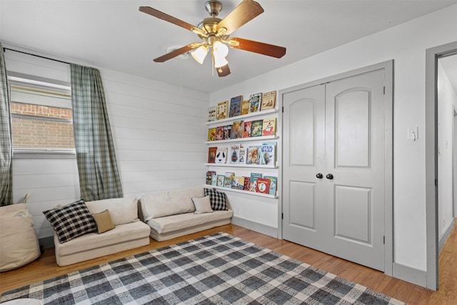 7516 Deaver Dr, North Richland Hills, TX 76180 - sitting room with wood finished floors and ceiling fan