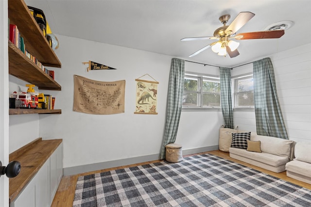 7516 Deaver Dr, North Richland Hills, TX 76180 - sitting room featuring light wood finished floors and ceiling fan