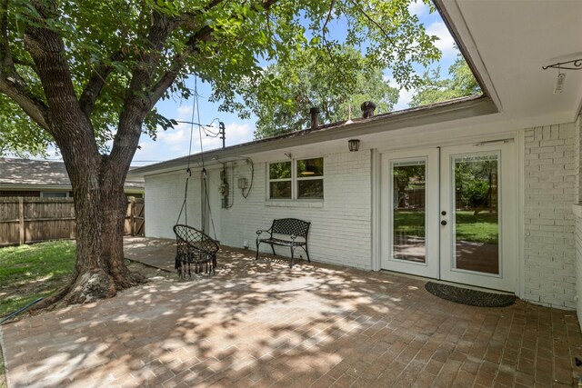 7516 Deaver Dr, North Richland Hills, TX 76180 - view of patio / terrace with french doors