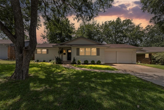 7516 Deaver Dr, North Richland Hills, TX 76180 - ranch-style house featuring an attached garage, a front lawn, driveway, and brick siding
