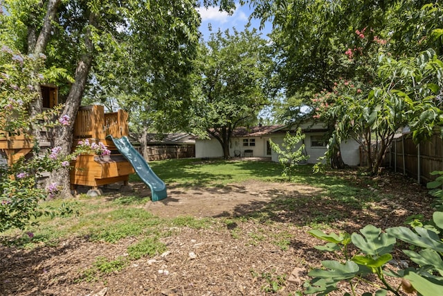 7516 Deaver Dr, North Richland Hills, TX 76180 - fenced backyard with a playground