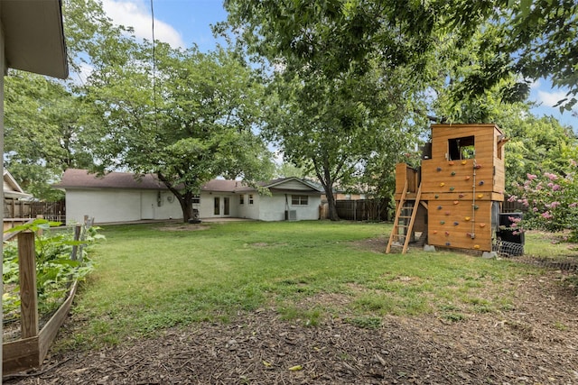 7516 Deaver Dr, North Richland Hills, TX 76180 - view of yard featuring a playground