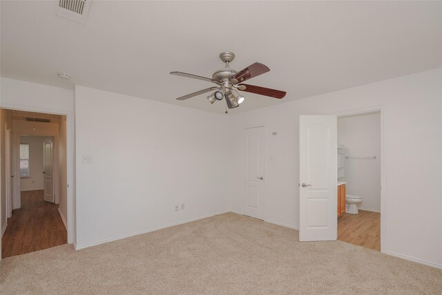 2912 Lighthouse Dr, Denton, TX 76210 - unfurnished bedroom featuring carpet flooring, ensuite bathroom, and a ceiling fan