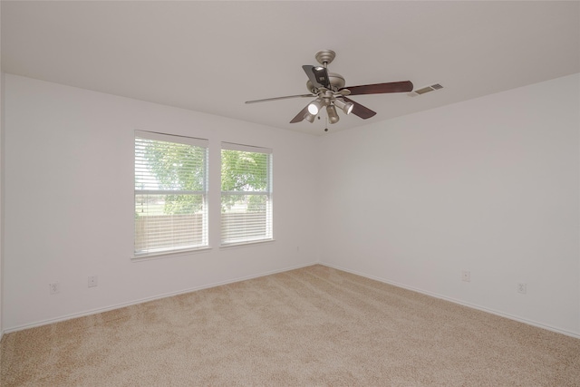 2912 Lighthouse Dr, Denton, TX 76210 - carpeted spare room featuring ceiling fan and baseboards