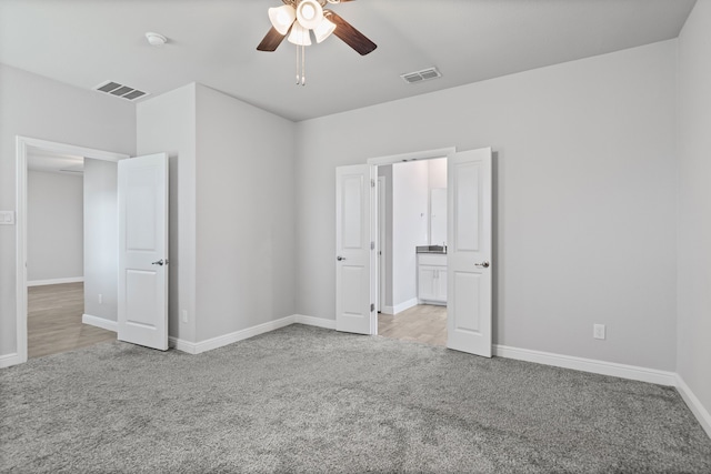 724 Cromane Rd, Fort Worth, TX 76052 - unfurnished bedroom with carpet flooring, a ceiling fan, and connected bathroom
