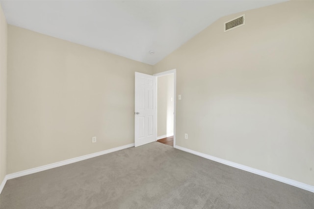 1724 Lincolnshire Way, Fort Worth, TX 76134 - carpeted spare room featuring lofted ceiling and baseboards