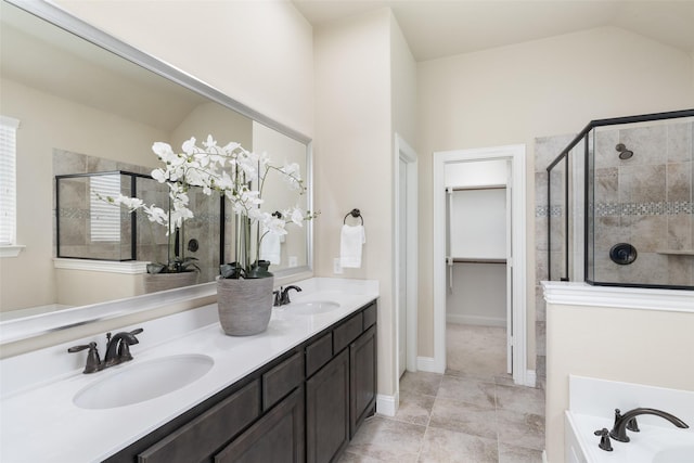 1809 Camo Ct, Allen, TX 75002 - bathroom with a stall shower, double vanity, a garden tub, a walk in closet, and tile patterned floors