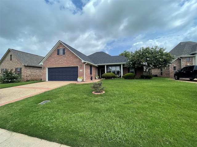 774 Hackberry Dr, Bossier City, LA 71111 - view of front facade featuring brick siding, an attached garage, a front lawn, driveway, and roof with shingles