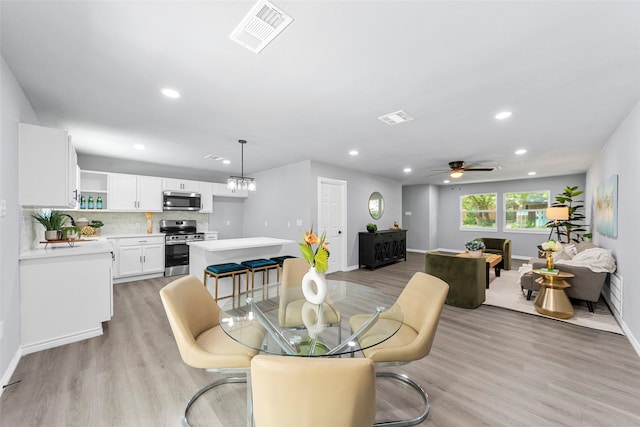 2473 W Five Mile Pkwy, Dallas, TX 75233 - dining space with light wood-style floors, recessed lighting, and ceiling fan