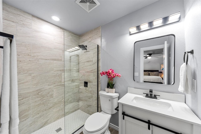 2473 W Five Mile Pkwy, Dallas, TX 75233 - ensuite bathroom with vanity, walk in shower, and ceiling fan