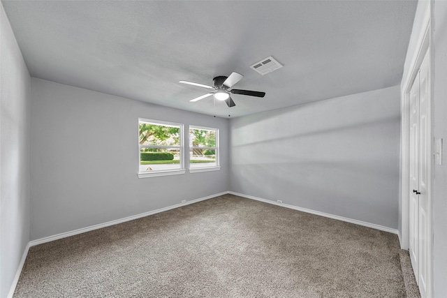 2473 W Five Mile Pkwy, Dallas, TX 75233 - spare room featuring carpet flooring and a ceiling fan