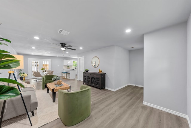2473 W Five Mile Pkwy, Dallas, TX 75233 - living area with recessed lighting, a ceiling fan, and light wood finished floors
