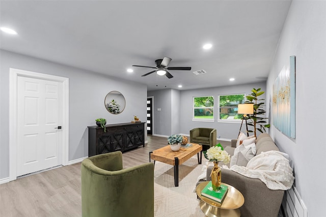 2473 W Five Mile Pkwy, Dallas, TX 75233 - living area with baseboard heating, light wood-style floors, recessed lighting, and ceiling fan