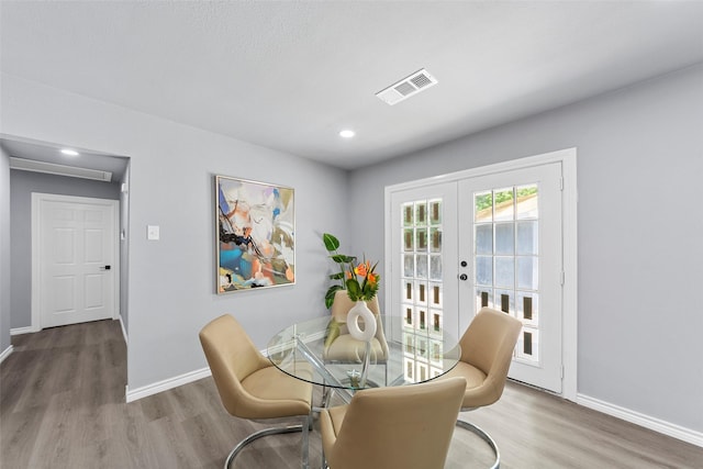 2473 W Five Mile Pkwy, Dallas, TX 75233 - dining area featuring wood finished floors, french doors, and recessed lighting