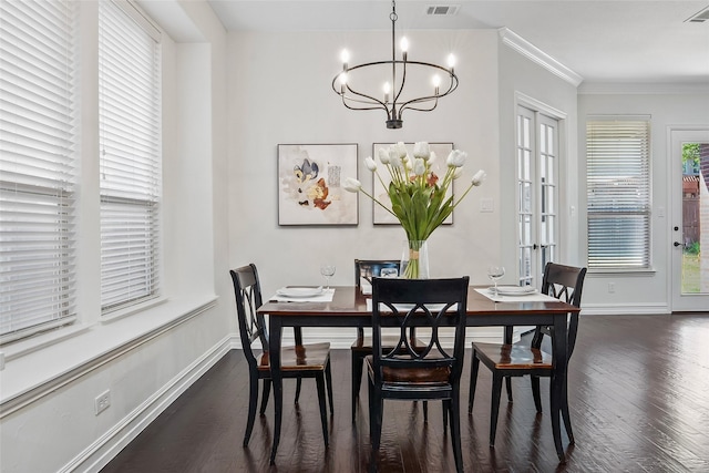 2542 Morgan Ln, Trophy Club, TX 76262 - dining area with dark wood finished floors, a chandelier, and ornamental molding