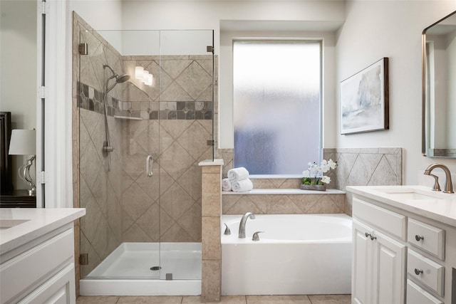 2542 Morgan Ln, Trophy Club, TX 76262 - full bathroom with vanity, a garden tub, a stall shower, and tile patterned floors