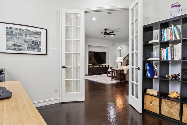 2542 Morgan Ln, Trophy Club, TX 76262 - home office with french doors, arched walkways, wood finished floors, and a ceiling fan