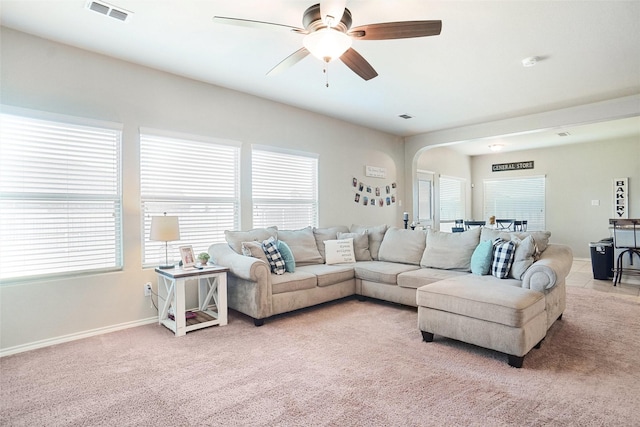 322 Chestnut Ln, Ponder, TX 76259 - living area with a ceiling fan, arched walkways, and light colored carpet