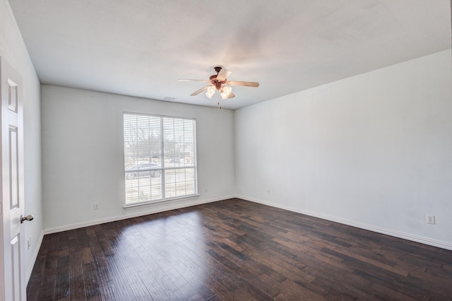 7101 Bickers Dr, Rowlett, TX 75089 - empty room with a ceiling fan and dark wood finished floors