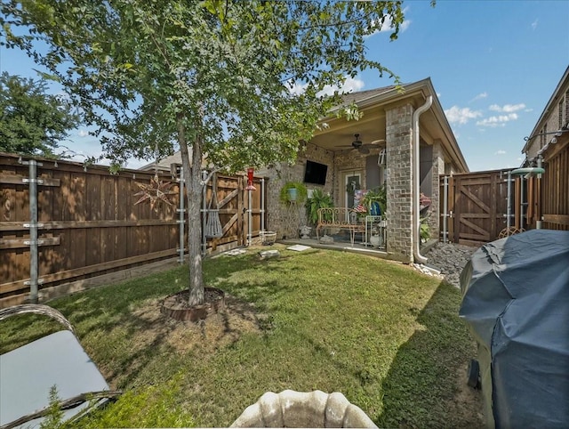 2332 Evening Stone Dr, Little Elm, TX 76227 - fenced backyard with a gate and ceiling fan