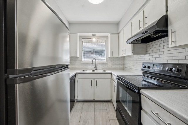 2529 W 12th St, Dallas, TX 75211 - kitchen featuring black appliances, under cabinet range hood, backsplash, and light countertops