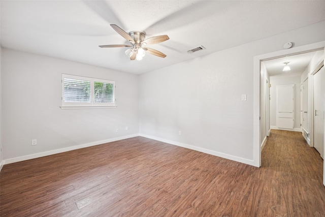 2529 W 12th St, Dallas, TX 75211 - unfurnished room with ceiling fan, wood finished floors, and a smoke detector