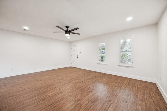 2529 W 12th St, Dallas, TX 75211 - spare room featuring wood finished floors, ceiling fan, and recessed lighting