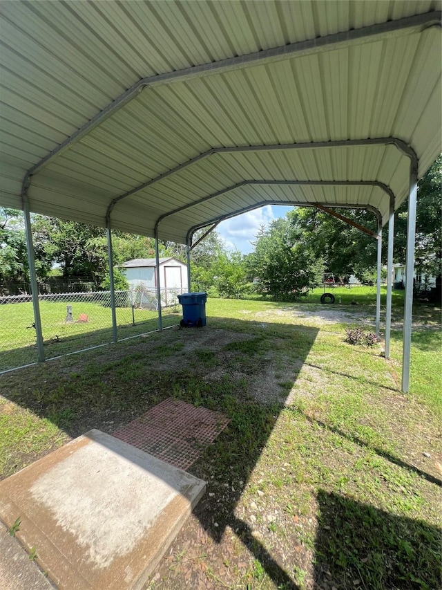 717 N 37th St, Corsicana, TX 75110 - view of yard featuring a storage shed and a carport