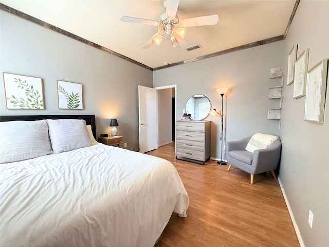 3541 Cripple Creek Trl, Fort Worth, TX 76262 - bedroom with crown molding, wood finished floors, and a ceiling fan