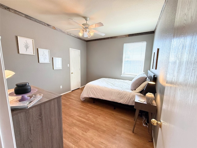 3541 Cripple Creek Trl, Fort Worth, TX 76262 - bedroom featuring light wood-type flooring, crown molding, and a ceiling fan