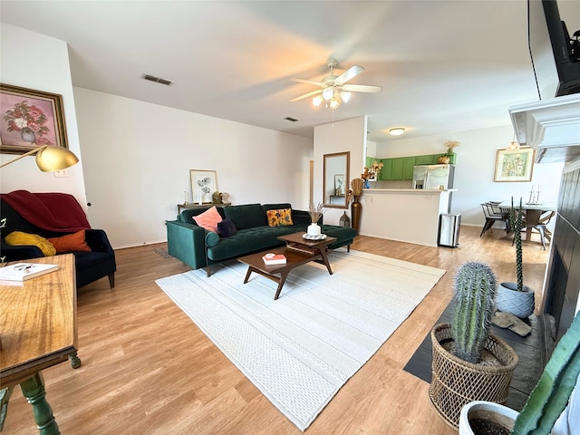 3541 Cripple Creek Trl, Fort Worth, TX 76262 - living area with a ceiling fan and light wood-style flooring