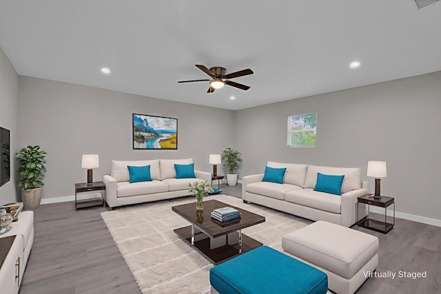 5274 Questa Dr, Abilene, TX 79605 - living area with wood finished floors, ceiling fan, and recessed lighting