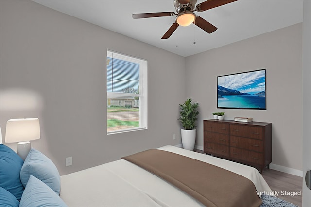 5274 Questa Dr, Abilene, TX 79605 - bedroom featuring light wood-style floors and ceiling fan