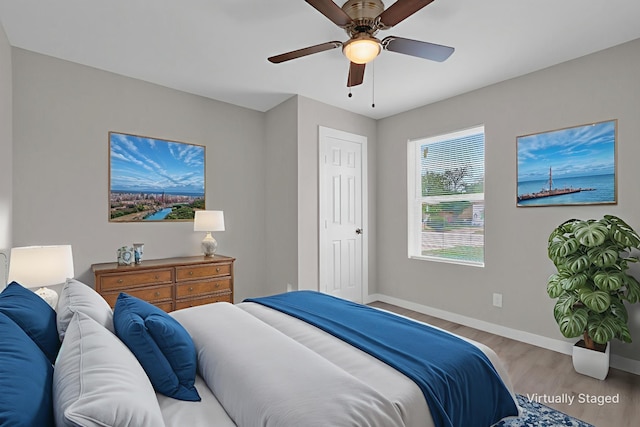 5274 Questa Dr, Abilene, TX 79605 - bedroom featuring wood finished floors and ceiling fan