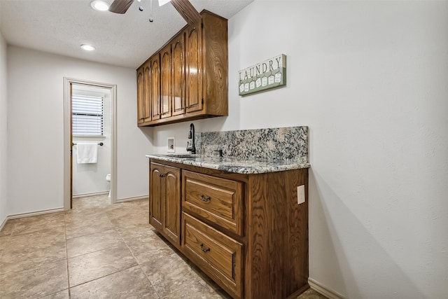 2526 Axminster Dr, Grand Prairie, TX 75050 - bathroom featuring a ceiling fan, double vanity, and recessed lighting