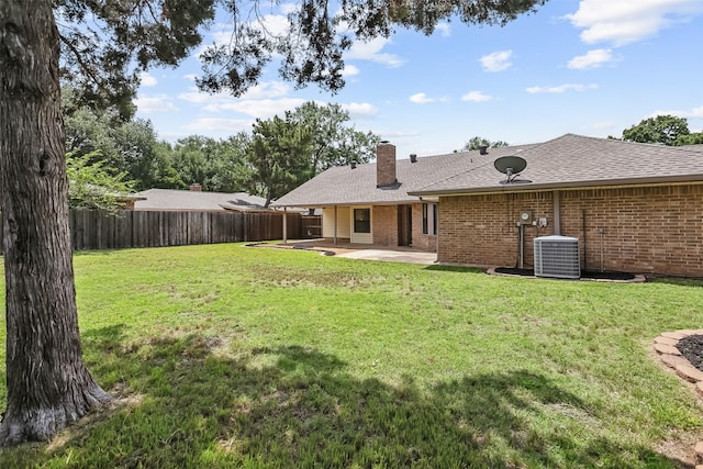 2526 Axminster Dr, Grand Prairie, TX 75050 - rear view of property with a patio, brick siding, a chimney, and roof with shingles