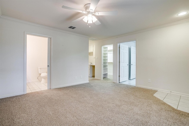 302 S Fox Ln, Burleson, TX 76028 - unfurnished room featuring crown molding, light colored carpet, light tile patterned floors, and a ceiling fan
