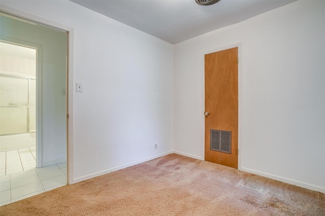 302 S Fox Ln, Burleson, TX 76028 - carpeted empty room featuring baseboards and tile patterned flooring