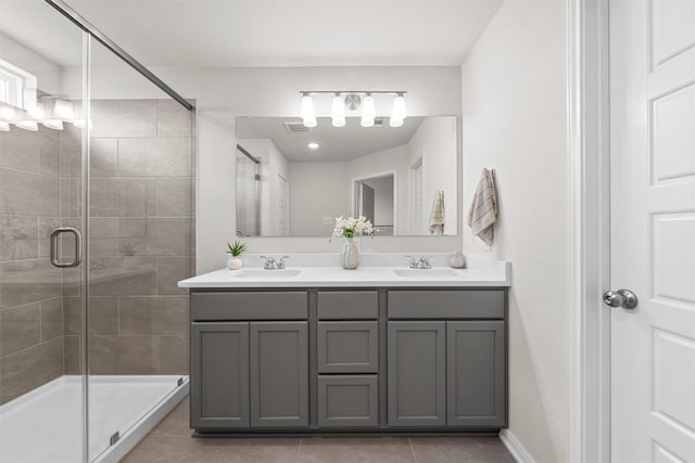 3401 Beutel Rd, Lorena, TX 76655 - bathroom featuring double vanity, tile patterned floors, and a stall shower